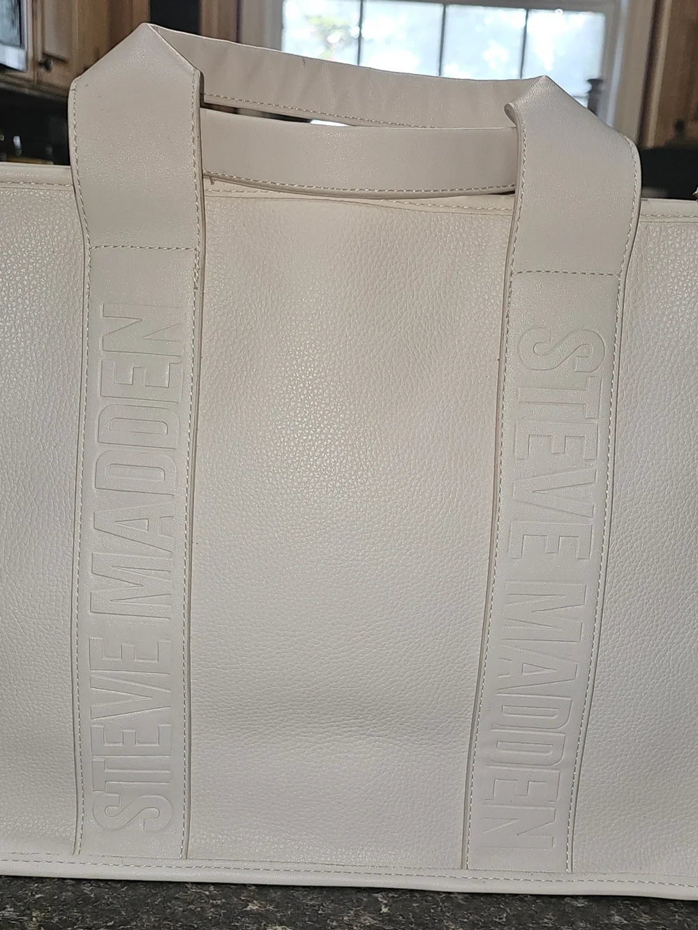 Steve Madden 14 across